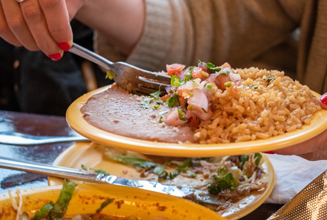 The rice and beans at Tavo's Antojitos y Tequila is dusted with crushed sea salt, adding a little texture to the cloud-like whipped beans. - PHOTO BY JACOB WALSH
