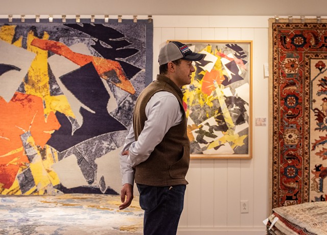 Reza Nejad Sattari's son and business partner, Hadi Sattari, says of the art-inspired rugs, "The only thing that will hurt the rugs is not using them." - PHOTO BY JACOB WALSH