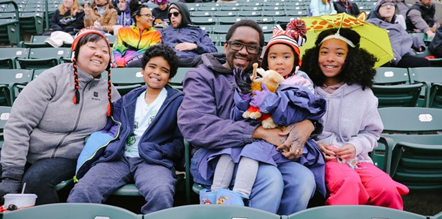 The McLarens (L to R: Andrea, Shea, Donald, Stella, and Sophie) had sunny smiles despite the gloomy, wet weather at the Red Wings season opener against the Lehigh-Valley IronPigs.
