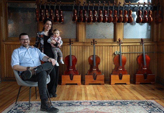 Sam Payton and Danielle Payton, with daughter Olympia, are owners of Payton Violins. The couple moved their business to a new location in the old CITY Newspaper offices in Neighborhood of the Arts. - PHOTO BY MAX SCHULTE