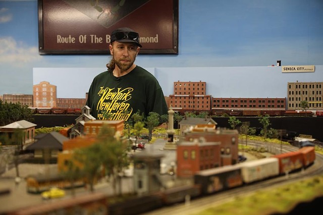 The Rochester Model Railroad Club on South Clinton Avenue has become a hangout for Alex Price. There, he runs his trains on the club's elaborate replica of the Lehigh Valley Railroad. - PHOTO BY MAX SCHULTE