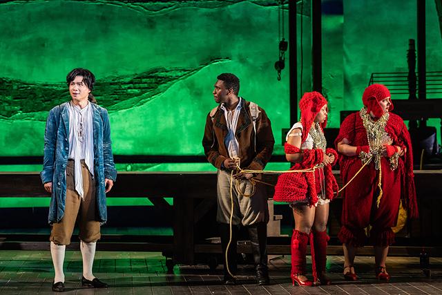 Tenor Jonathan Pierce Rhodes (second from left) plays Cacambo in Leonard Bernstein's "Candide" at the Glimmerglass Festival in 2023. - PHOTO BY EVAN ZIMMERMAN/THE GLIMMERGLASS FESTIVAL