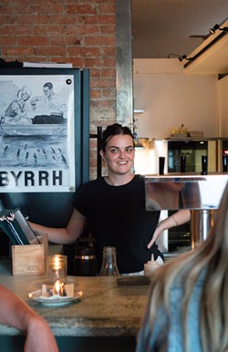 Microclimate owner and operator Ellie Dolan behind the bar. - PETE WAYNER.