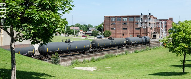 Trains carrying oil, like the ones above, drive through neighborhoods filled with schools, hospitals and houses. - PHOTO BY MARK CHAMBERLIN