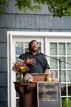 Ohio poet Scott Woods was a featured reader at the July 11event. - PHOTO BY JOHN SCHLIA