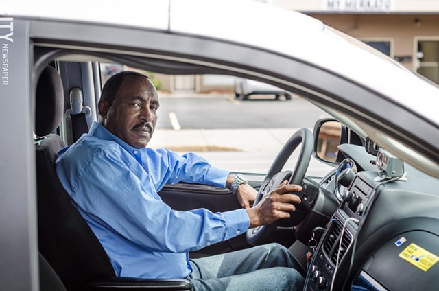 Melkie Demissie, a Rochester cab driver and owner of Park Avenue Taxi. - PHOTO BY MARK CHAMBERLIN