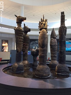 Still on view at the Rochester airport: "The Council," by Bill Stewart. - PHOTO BY MARY ANNA TOWLER
