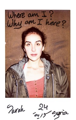 An image from "Take me to Jermany," a series of Polaroids of refugees taken by Charlotte Schmitz. - PHOTO PROVIDED