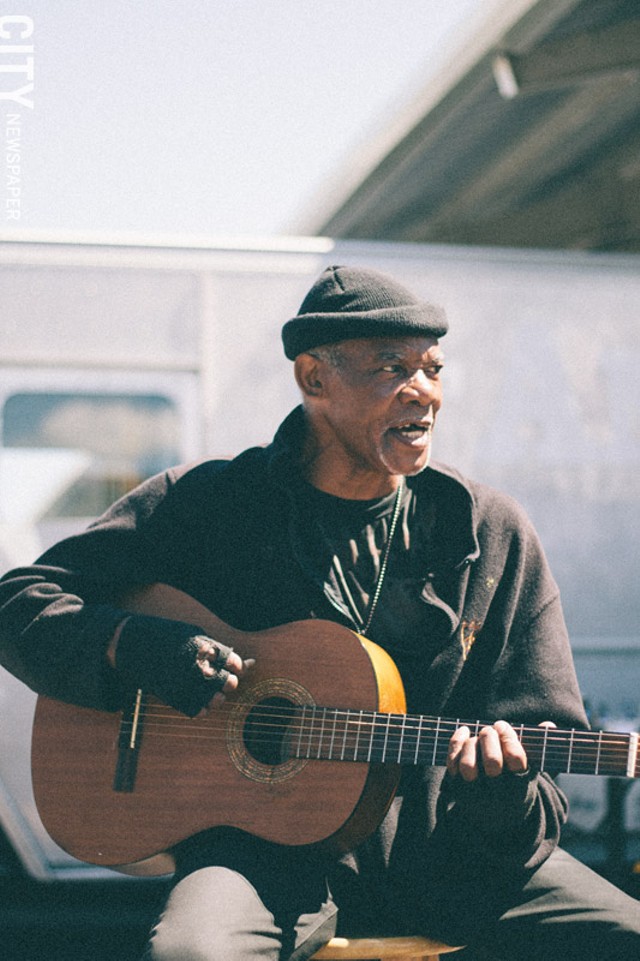 Bluesman John McClary, who has been playing guitar since he was 7 years old, plays at the market most Saturdays: - “Sometimes I come on Thursday, but ain’t nothing happening.” - PHOTO BY KEVIN FULLER
