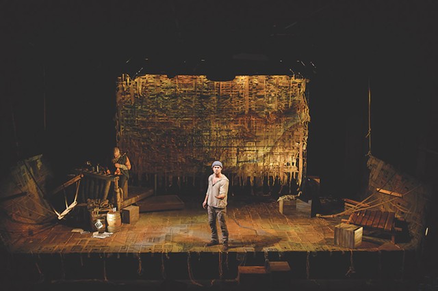 "An Iliad" on stage at Geva in 2016 featured scenic design by John Haldoupis and costume design by Georgiana Londré Buchanan. - PHOTO BY GOAT FACTORY MEDIA