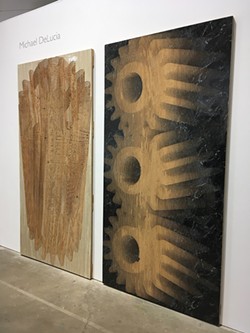 Michael DeLucia carved into plywood panels using a router attached to a CNC machine; the panels are at once low-relief sculptures, potential printing plates, and prints. - PHOTO BY REBECCA RAFFERTY