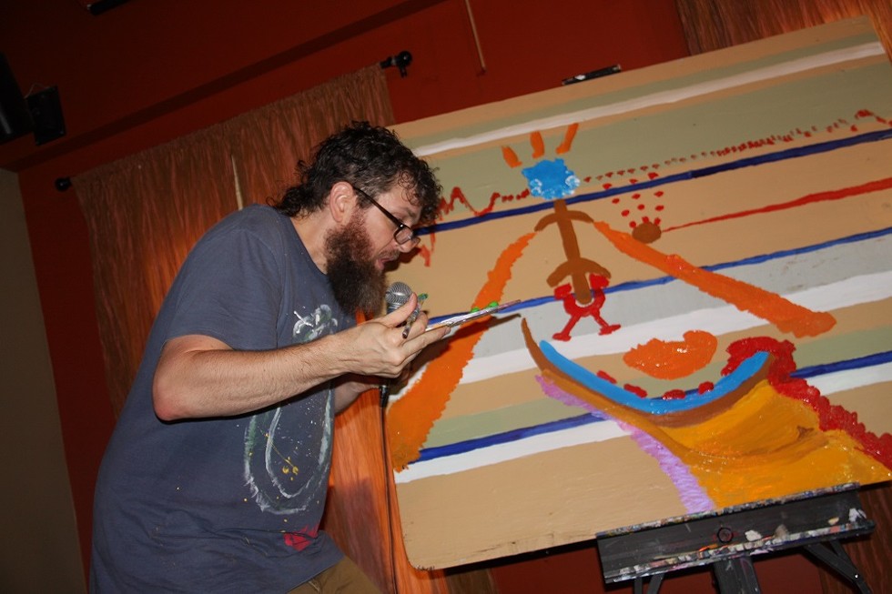 Seth Faergolzia paints while looping music during his show at Abilene. - PHOTO BY FRANK DE BLASE