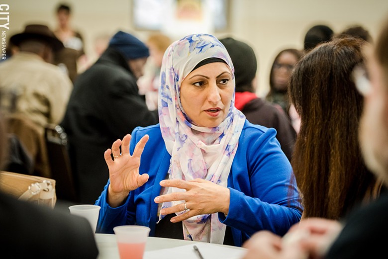Obaida Omar, representing Catholic Family Center's Refugee Resettlement program, spoke about the challenges many refugees face when they reach the US. - PHOTO BY JOSH SAUNDERS