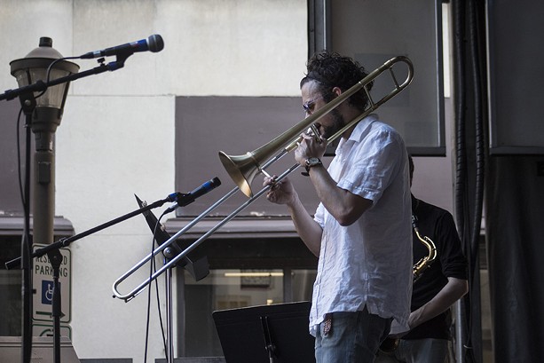 Rochester trombonist Abe Nouri played the Jazz Street Stage on Saturday at the Jazz Festival. - PHOTO BY ASHLEIGH DESKINS