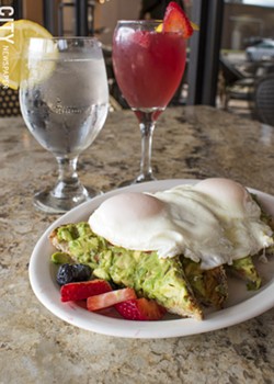 Blades' Avocado Toast and Pink Lady mimosa. - PHOTO BY RENÉE HEININGER