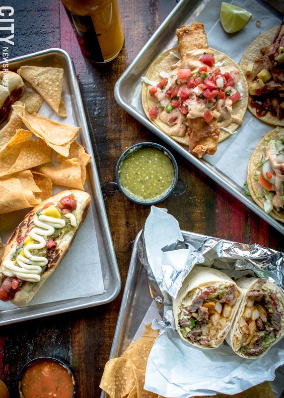 Old Pueblo Grill offers everything from traditional varieties of burritos and tacos to the Tucson dog (pictured on left), which is a regional favorite brought to Rochester by Chef Joe Zolnierowski. - PHOTO BY RYAN WILLIAMSON