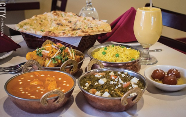 A feast for royals: some Indian cuisine standards, including chicken makhani and palak paneer, at Royal of India. - PHOTO BY JACOB WALSH
