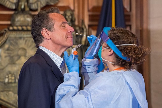 Gov. Andrew Cuomo is tested for the coronavirus in Albany on Sunday.