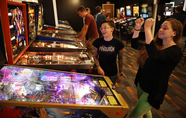Jeanette Fredrick, left, and Stacy Fredrick are fast becoming regulars at Rochester Pinball Collective.