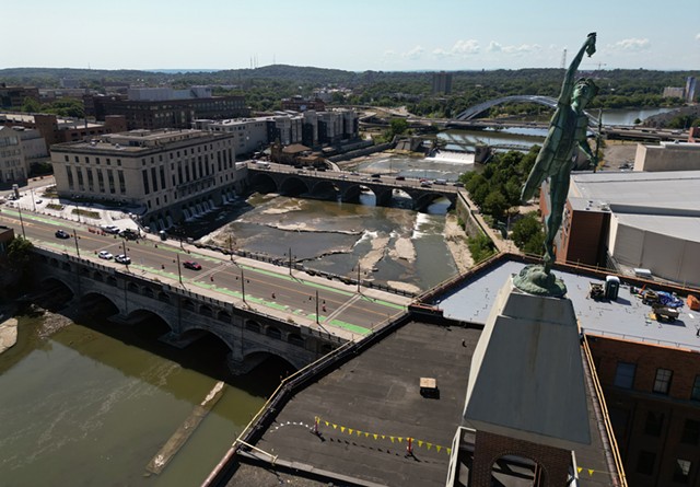 Work continues on the historic Aqueduct Building along the Genesee River and Broad Street bridge in downtown Rochester for the new Constellation Brands headquarters.