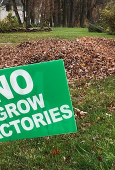 Lawn signs opposing a proposed indoor lettuce farm have sprouted around Webster.