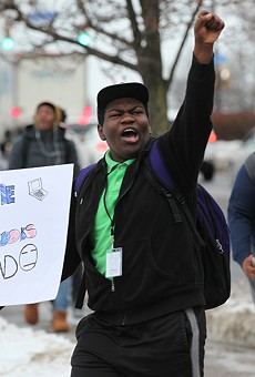 Prosper Holmes, an East High School freshman, was among the hundreds of students who walked out of classes Monday in protest of teacher layoffs across the Rochester City School District. Holmes was one of several students to reference the Chromebooks provided to students by the district. Some buildings lack the wireless internet connections necessary for the laptops to fully work.
