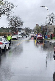 Scene of shooting by police of alleged parole absconder on Fairbanks St. near Hudson Ave. in Rochester on Friday, April 16, 2021.