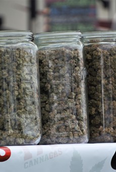 Jars of bud at Canna Gas's booth at the Cannabis Carnival.