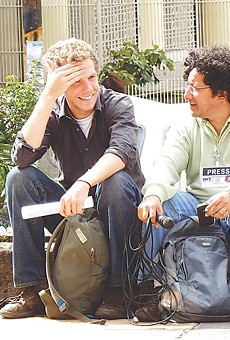 Canadian documentary filmmaker Jesse Freeston (left) discusses projects with Honduran radio host and producer Félix Molina.