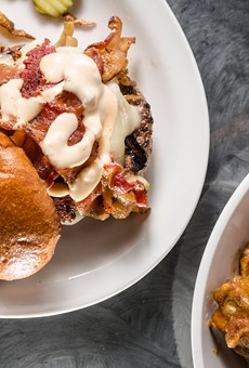 The Exchange at Corn Hill recently opened in the former space of Nathaniel's Pub. The restaurant has a pub-centric menu that features (pictured) The New Yorker, a burger with corned beef, caramelized onions, bacon, Swiss cheese, and Thousand Island dressing.