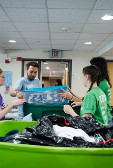 RIT volunteers sort through items collected through the Goodbye, Goodbuy! effort.