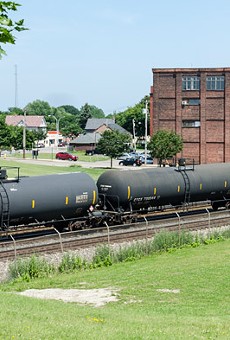 Trains carrying oil, like the ones above, drive through neighborhoods filled with schools, hospitals and houses.