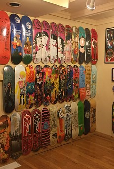 "Hoarders of Cool," featuring boards, T-shirts, and other items from the collections of members of the Rochester skateboard community, is on display at AMOR.