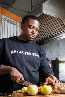 Calvin Eaton, who created the Gluten Free Chef blog, prepares food in the kitchen of his new community center, 540WMain. Eaton wants to use the space for art, culinary, and educational programs for Rochester youth, and to promote the Susan B. Anthony Neighborhood.
