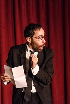 Michael Burgos performed his one-man show, "The Eulogy," at Writers & Books Thursday evening.