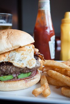 Tryon City Tavern recently opened in the Triangle neighborhood, in the space that housed Ellison's. Seen here is the Late Riser burger, with avocado, bacon, cheddar, fried egg, and chipotle mayo.