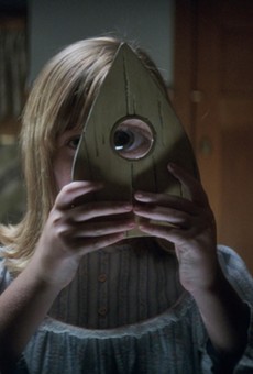 Lulu Wilson spies something sinister in "Ouija: Origin of
Evil."