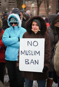 Photo Gallery: Rally Draws Opposition To Trump's Ban