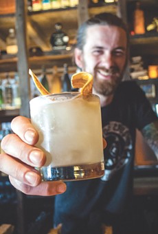 Zack Mikida worked with SCN Hospitality to open Bitter Honey on Railroad Street. In his hand is the Banana Hammock, which mixes blanco tequila, banana cordial, lime, and habanero.