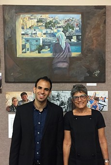 Bshara Nassar and Mary Panzer, co-curators of "Bethlehem Beyond the Wall," an exhibit of the Museum of the Palestinian People currently installed at Nazareth College.