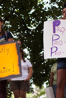 Abortion rights supporters during a 2013 demonstration protesting a an anti-abortion group's annual meeting, which was held in Rochester that year.