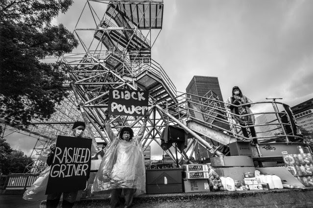 "Black Power," an image by Rochester-based photographer Erica Jae, will be part of an art installation accompanied by a series of events at The Black House.
