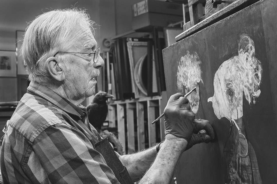 The work of Robert Ernst Marx (pictured in his studio) is currently featured in a show at Rochester Picture Frame, in celebration of sixty years of making art. - PHOTO BY JOHN SOLBERG