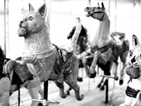 Animals on the carousel? Yes. Racist art, no