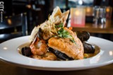 PHOTO BY MARK CHAMBERLIN - Nicolas Grammatico recently opened Black Sheep in Corn Hill Landing, with a focus on French cuisine using fresh, house-made ingredients. Pictured above is the Bouillabaisse, which will always be on the menu, but will change ingredients based on what is fresh and available.