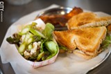 PHOTO BY KEVIN FULLER - A vegan Hummus Raclette sandwich with a seasonal salad at Relish. Owner Stephen Rees has been running Relish as a food delivery service, but he recently opened a brick-and-mortar location in the South Wedge.