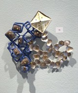 PHOTO BY REBECCA RAFFERTY - Juan Carlos Caballero-Perez, 'Brooch Patterns" with sterling silver; 18, 22, and 24k gold; bronze, brown diamond, copper enamel, felt, stainless steel pins, and pearls.