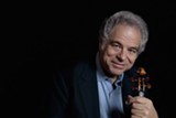 PHOTO BY LISA MARIE MAZZUCCO - Violinist Itzhak Perlman has appeared with the Rochester Philharmonic Orchestra several times since 1970. His latest concert with the orchestra, on Tuesday, will feature film scores composed by or arranged by John Williams.
