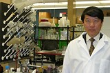 PHOTO BY KRESTIA DEGEORGE - University of Rochester Professor David Wu in his lab: "There's both challenge and promise."