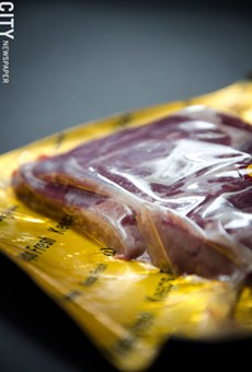 Vacuum-sealed packages help extend the shelf life of meat cuts.